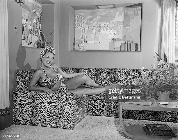 Carmen Miranda was so delighted with her new leopard skin bathing suit that she had the den in her Hollywood home decorated to match it. However,...