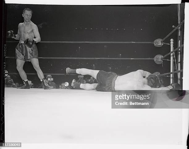Tony Zale of Gary, Indiana, starts for neutral corner after knocking out Rocky Graziano in the third round of their scheduled 15 round middleweight...