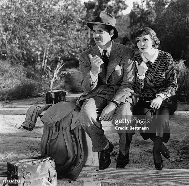 Clark Gable and Claudette Colbert try to get a lift in the great Frank Capra comedy "It Happened One Night," which won the 1934 Academy Award for...