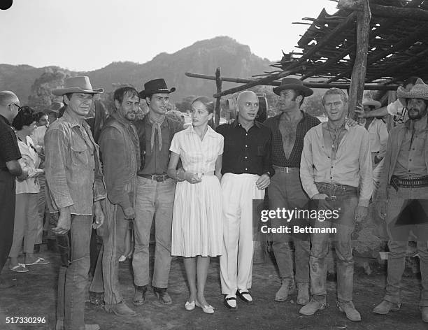 Yul Brynner with his recently married wife Doris, on the set of The Magnificent Seven. From left to right, are Charles Bronson, Eli Wallach, Horst...