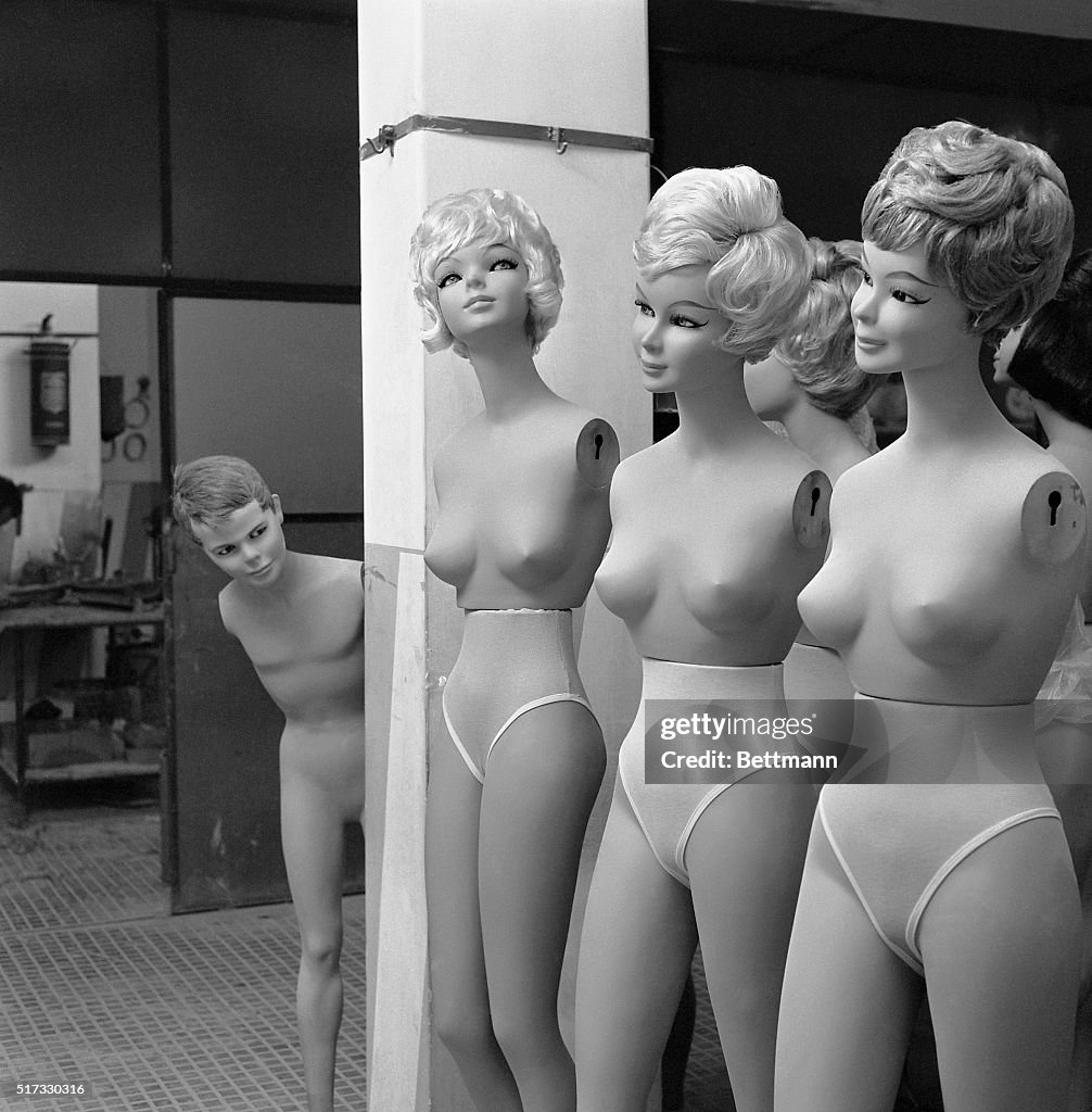 "Peeping Tom" and Female Mannequins