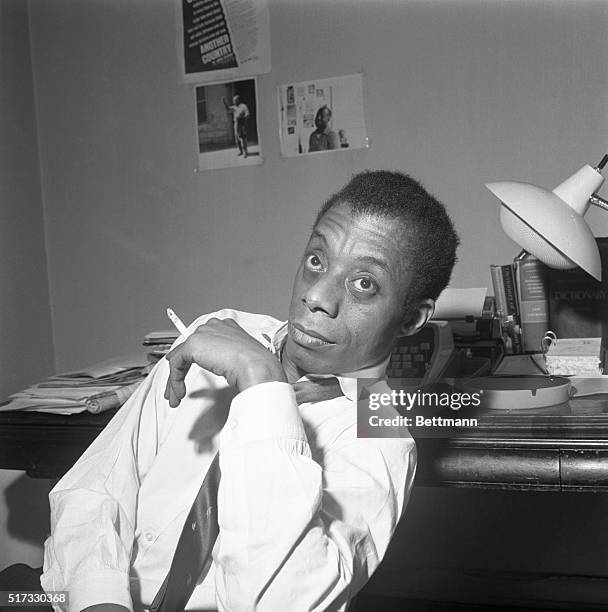 Photographer of author James Baldwin smoking a cigarette.
