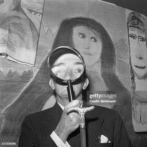 Salvador Dali judges an amateur art contest at the Arnold Constable Department Store in New York. | Location: Arnold Constable Department Store, New...