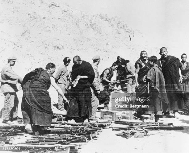 Tibetan Buddhist monks surrender to PLA troops after an armed insurrection. Lhasa, April 7, 1959.