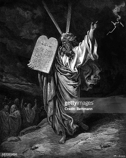 Moses coming down from Mount Sinai. Woodcut by Dore.
