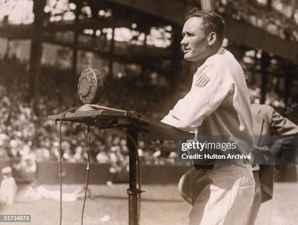 American baseball player Walter Johnson , pitcher for the Washington Sentors, makes a speech during the celebration of his 20th year with the team at...