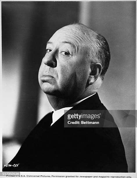 Director Alfred Hitchcock in a typical pose. Undated Photo.