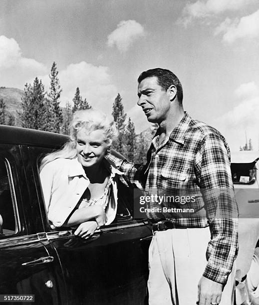 Joe DiMaggio visits Marilyn Monroe, on location in the Canadian wilderness, while filming River of No Return.