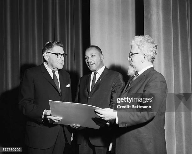 Kiamesha Lake, NY: George Maislen , President of the United Synagogue of America, presents the Solomon Schechter Award to Reverend Dr. Martin Luther...