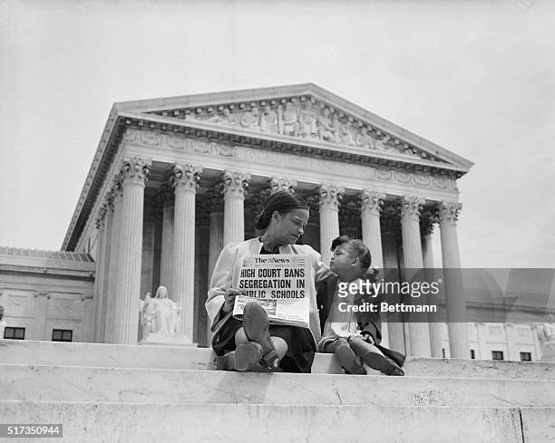 Nettie Hunt and her daughter Nickie sit on the steps of the U.S. Supreme Court. Nettie explains to her daughter the meaning of the high court's...