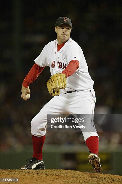 Pitcher Mike Timlin of the Boston Red Sox pitches during game one of the 2004 World Series against the St. Louis Cardinals at Fenway Park on October...