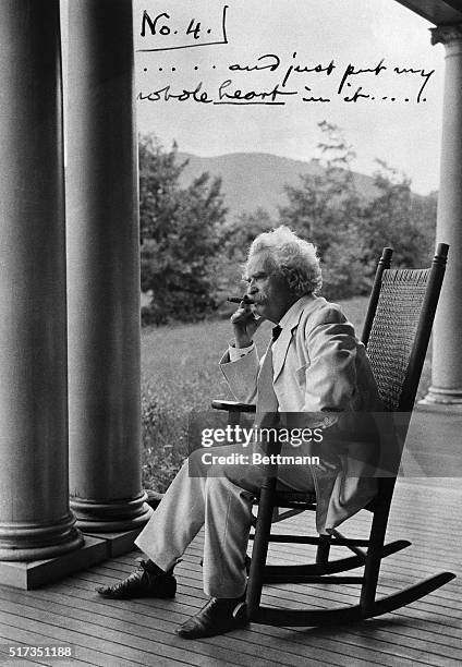 Samuel Clemens sits in a rocker on the front porch of his family's home in New Hampshire, enjoying a cigar. The annotated photograph was one in a...