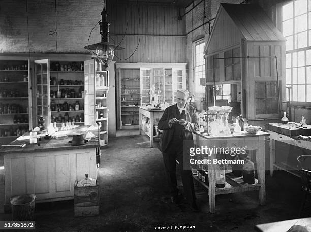 Portrait of Thomas Edison standing in his chemical laboratory at Menlo Park, New Jersey. Undated photograph.