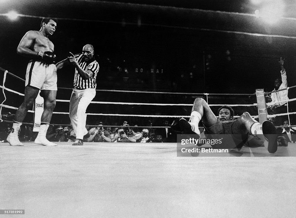 Muhammad Ali Knocks George Foreman onto the Canvas