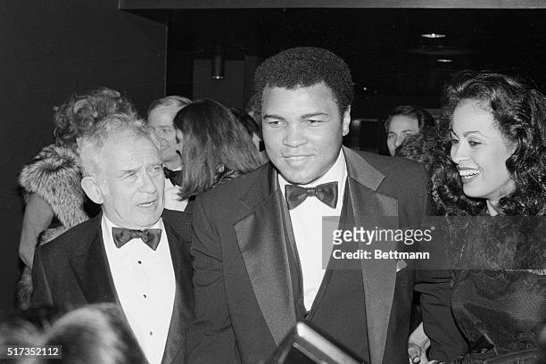 New york, NY- Former heavyweight champion Muhammad Ali and his wife, Veronica, chat with author Norman Mailer at a bash marking the 50th anniversary...