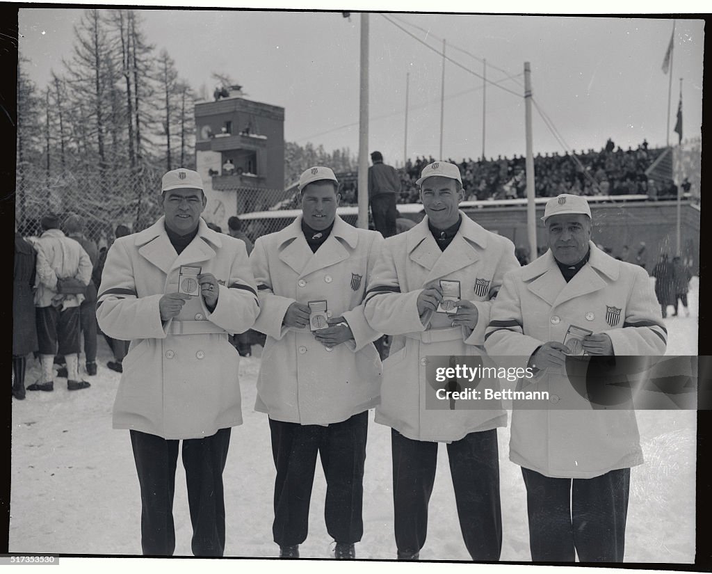 US Four Man Olympic Bobsled Team Displaying Medals