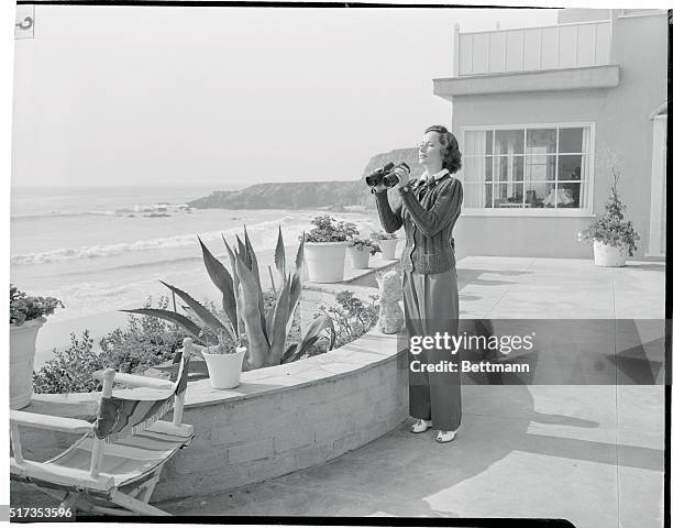 Star at Home. Tranca Beach, California: Mistress of all she surveys, Merle Oberon watches beach activities. Her Tranca Beach home, far from...