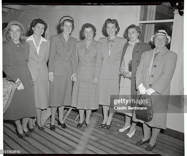 Chosen to represent the US in the Curtis Cup matches against the British at Birkdale, England, America's top women golfers sail aboard the Liner...