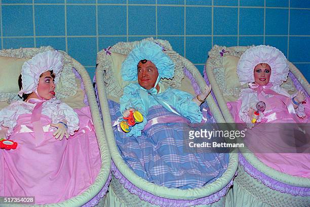Fort Lauderdale, Florida: A closer look at these "newborn triplets" will reveal that they are L-R, Brooke Shields, Bob Hope and Morgan Fairchild as...