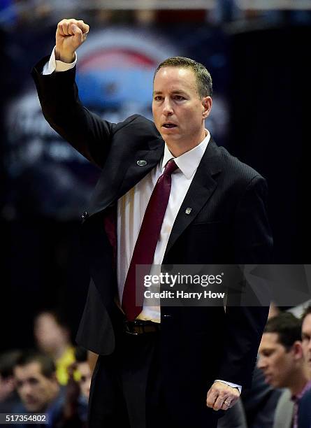 Head coach Billy Kennedy of the Texas A&M Aggies cheers on his team in the second half while taking on the Oklahoma Sooners in the 2016 NCAA Men's...