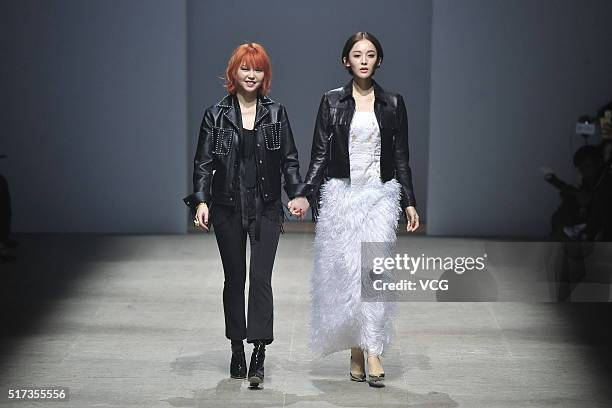 Fashion designer Zhao Tao , actress and model Gulnazar showcase on runway during the 2016 Alexander.T.Zhao Collection Autumn/Winter on March 24, 2016...