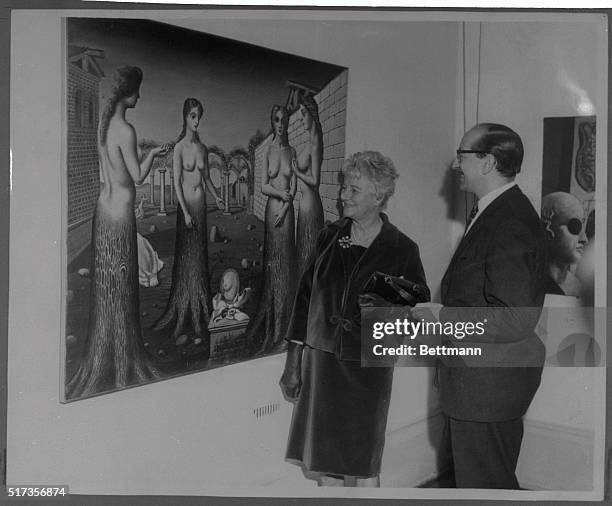 London, England: Mrs. Pegy Guggenheim, who has been a controversial figure in the art world for 40 years, and Norman Reid, director of London's Tate...
