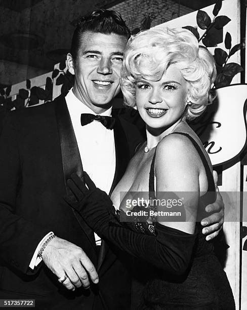 Busty Jayne Mansfield surprised even Hollywood's jaded eyes when she arrived at a recent filmtown soiree with her husband Mickey Hargitay dressed in...
