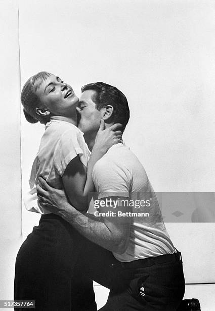 Joanne Woodward and Paul Newman as Clara Varner and Ben Quick in the film ;The Long Hot Summer;, based on a novel by William Faulkner and directed by...