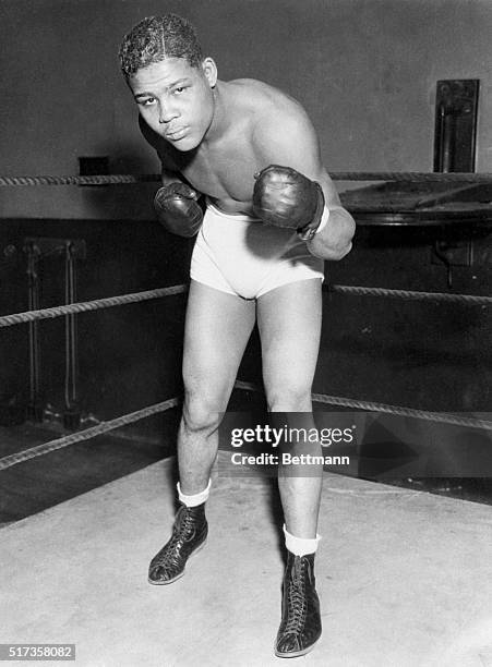 Detroit, MI -ORIGINAL CAPTION READS: Joe Louis, 188-pound Detroit, MIch. Negro, former Golden Gloves Champion, who has taken eleven wins, most of...