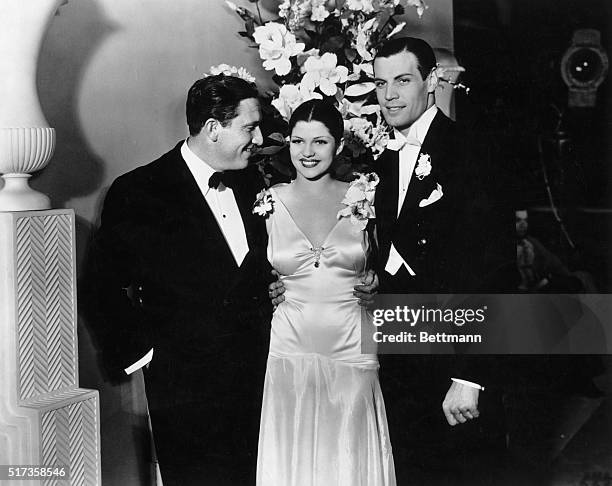 Rita Hayworth when she appeared with Spencer Tracy and Gary Leon in her first picture "Dante's Inferno" 1935. Her latest production is Columbia's...
