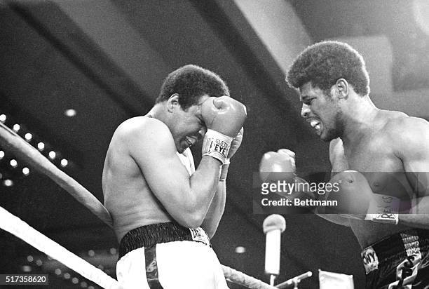 Las Vegas, NV- Heavyweight champion Muhammad Ali grimaces as challenger Leon Spinks gets in a stinging right cross to the jaw in the 3rd round of...