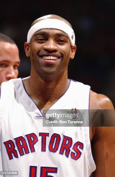 Vince Carter of the Toronto Raptors stands on the court during the game against the Detroit Pistons on November 5, 2004 at the Air Canada Centre in...