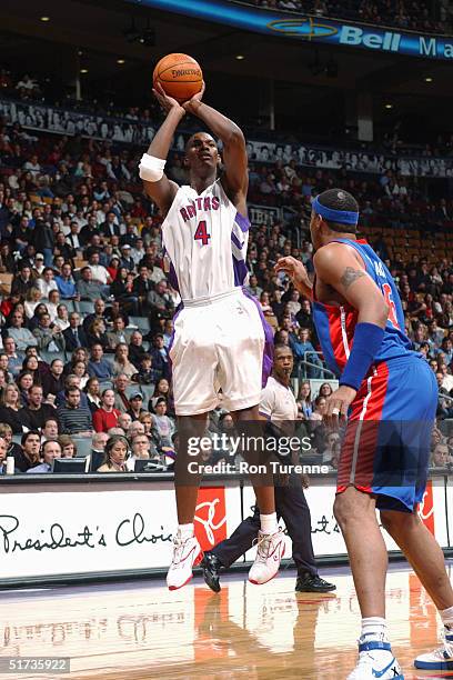 Chris Bosh of the Toronto Raptors shoots the ball during the game against the Detroit Pistons on November 5, 2004 at the Air Canada Centre in...