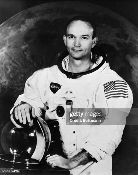 One of the three Apollo 11 astronauts, Michael Collins, is shown in his uniform and helmet in this pose.