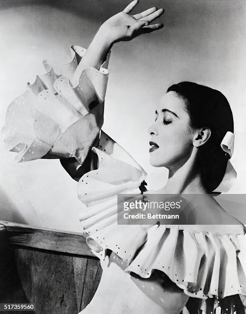 Martha Graham, noted innovator in modern dance, as the young bride in her ballet "Appalachian Spring." Undated photograph. Composer: Aaron Copland.
