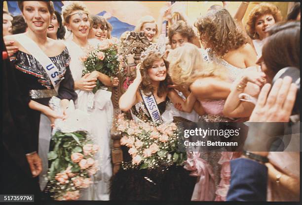 Karen Baldwin, the former Miss Canada, sits on her throne after winning the title of Miss Universe 1982. Karen is a native of London, Ontario.