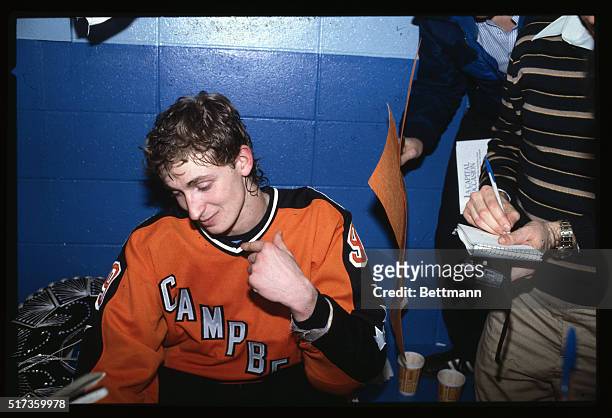 Wayne Gretzky tries on a sombrero 2/8 in the locker room after his fabulous four-goal performance in the NHL All-Star game at the Nassau Coliseum.