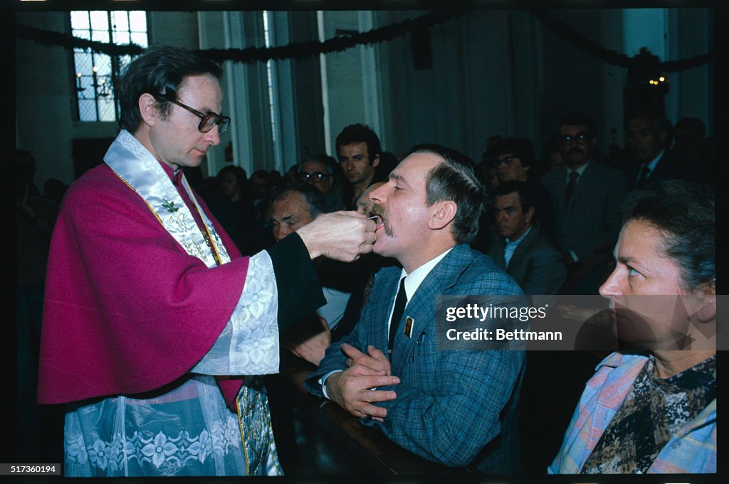 Lech Walesa Receiving Communion