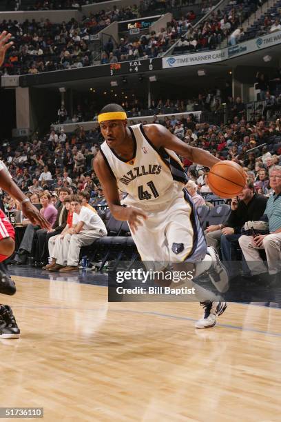 James Posey of the Memphis Grizzlies moves the ball during the game against the Houston Rockets at FedEx Forum on Novmeber 5, 2004 in Memphis,...