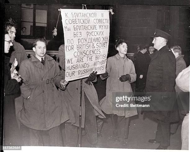 London, England- British ex-GI's whose Russian War brides have been denied permission to join them in England, picket Lancaster House at the opening...