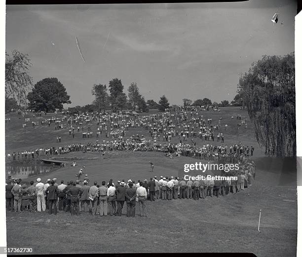 Mike Turnesa is putting on second hole of Norwood Hills Country Club during the final round of PGA championship play. His opponent, Ben Hogan, beat...