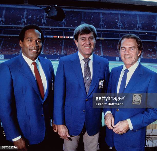 S NFL Monday Night Football sportscasters O.J. Simpson, Don Meredith, and Frank Gifford at the Silverdome, where the Detroit Lions are playing host...