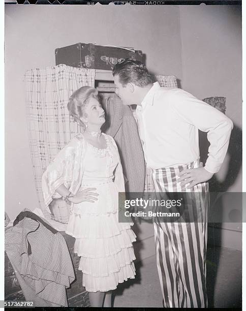 Hollywood: Hollywood Newsreel. Ann Sothern and Jack Carson shown in between scenes discussion on the set of Warner Brothers Production of April...