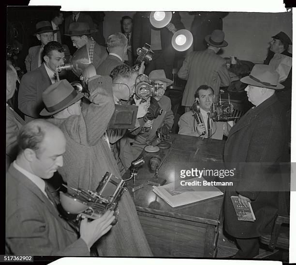 Whittaker Chambers, the Senior Editor of Time Magazine and former Communist spy courier, faces a barrage of cameras at U.S. Courthouse, December 7th,...