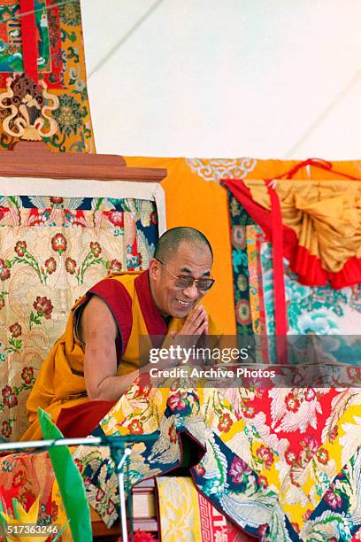 San Rafael, Calif.: The Dalai Lama smiles as he recognizes the crowd gathered on top of Mount Tamalpais to hear the Nobel peace prize winner perform...