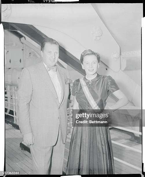 Fords arrive...Mr. And Mrs. Henry Ford II arrive aboard the Queen Elizabeth, July 26th. He is the President of the Ford Motor Company.