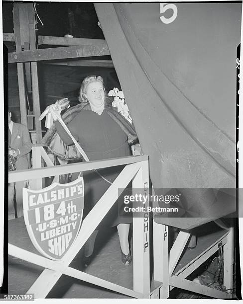 Actress and singer Kate Smith christens the Liberty Ship Josiah N. Cushing.