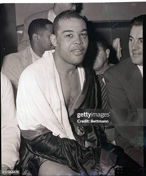 New York, New York- Joe Louis gives out with a smile of victory in his dressing room after he KO'd Lee Savold in the 6th round of their schedueled...