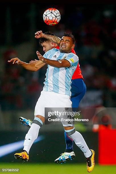 Eugenio Mena of Chile fights for the ball with Gabriel Mercado of Argentina during a match between Chile and Argentina as part of FIFA 2018 World Cup...