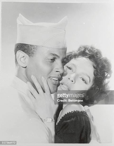 Dorothy Dandridge and Carry Belafonte as they appear in the film 'Carmen Jones', 1954. Directed by Otto Preminger.